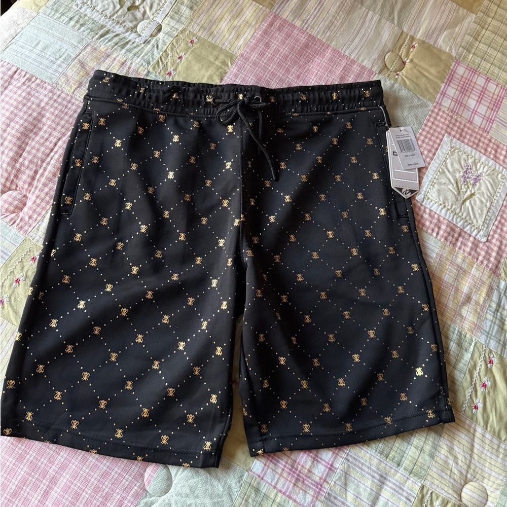 Men’s Size Large  Black and Gold Shorts NWT‎ with side and back pocket.
